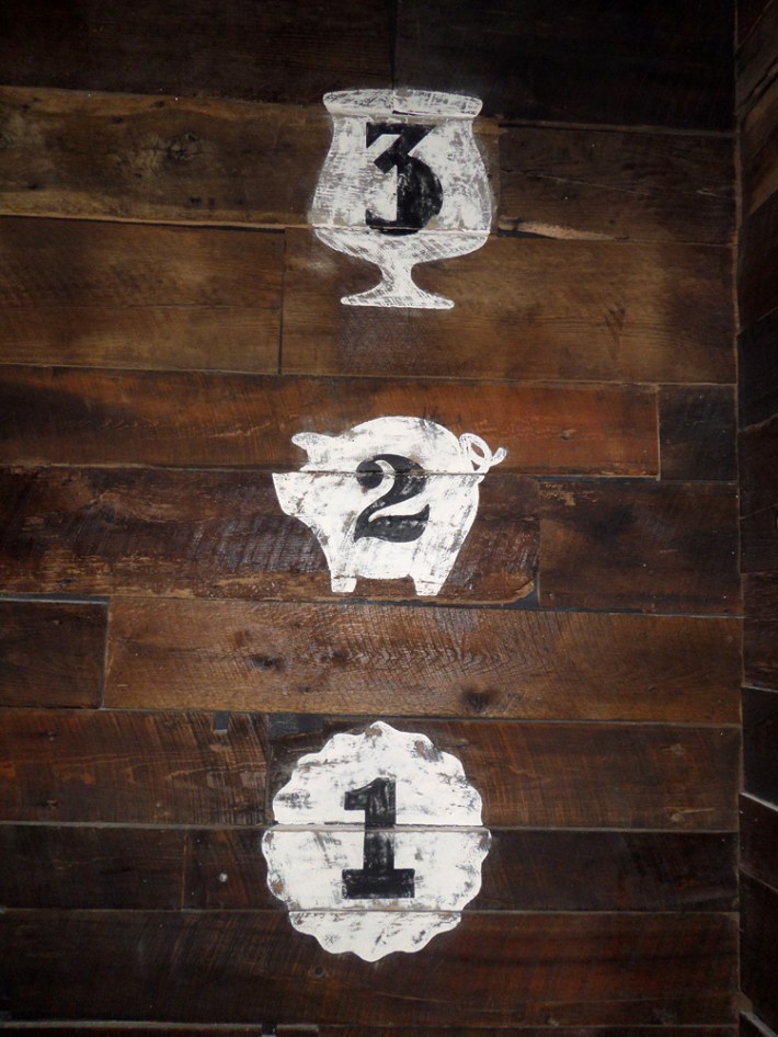 three, hand-painted wall marks